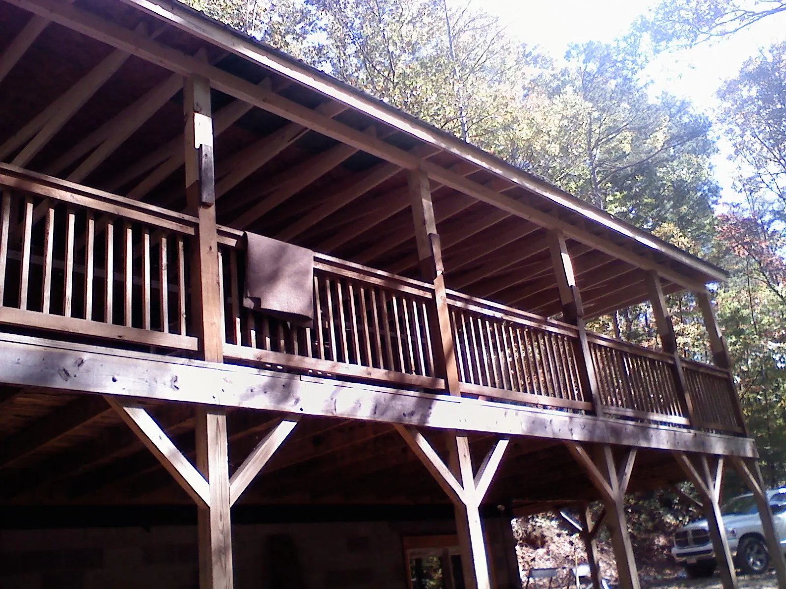 Timber framing under a new elevated porch and deck — Roof Leak Repair in Helper by Roofing Brothers
